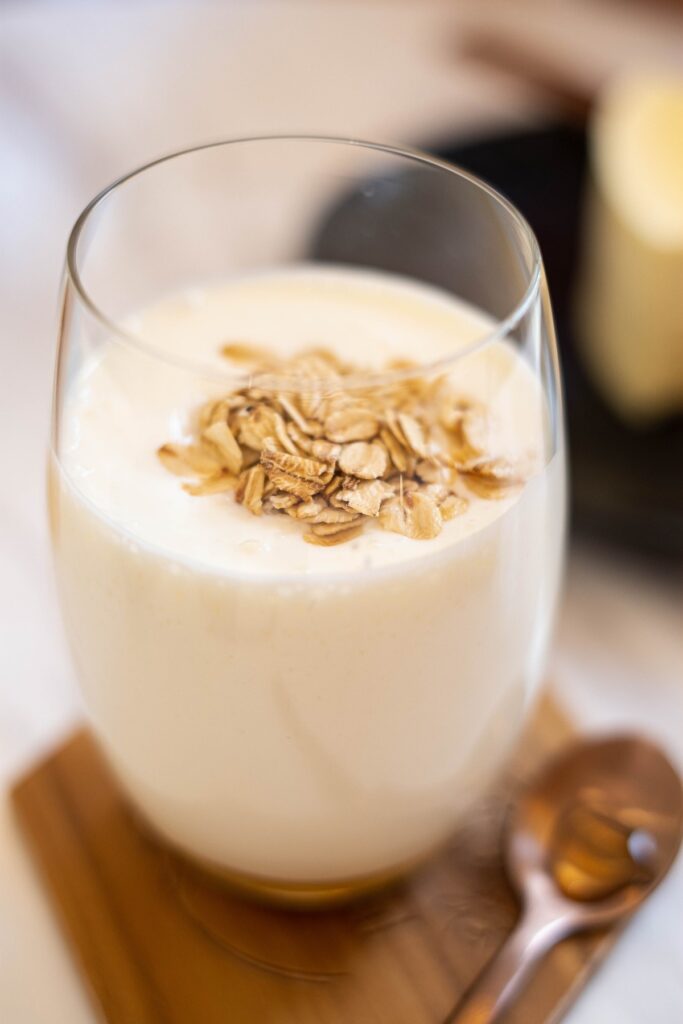 White smoothie with oat toppings