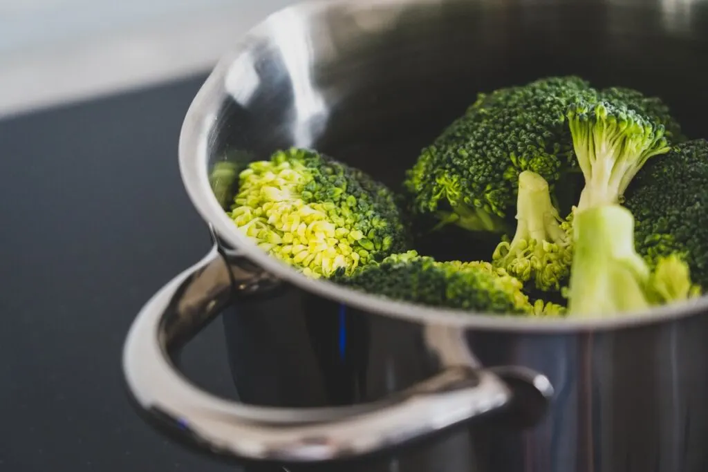 Broccoli in a stainless steel cooking pot